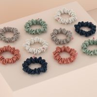 Svilena elastika za lase Twinkling White MIDI